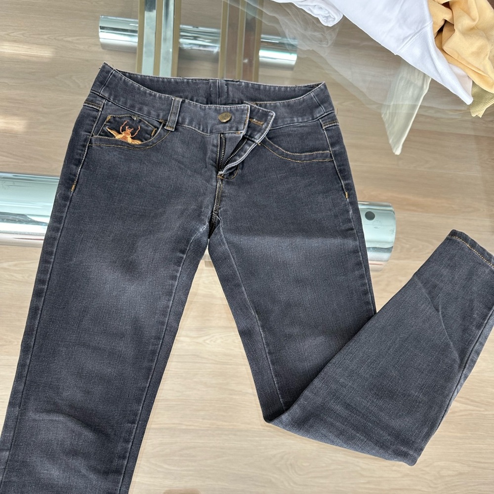 grey jeans with bee